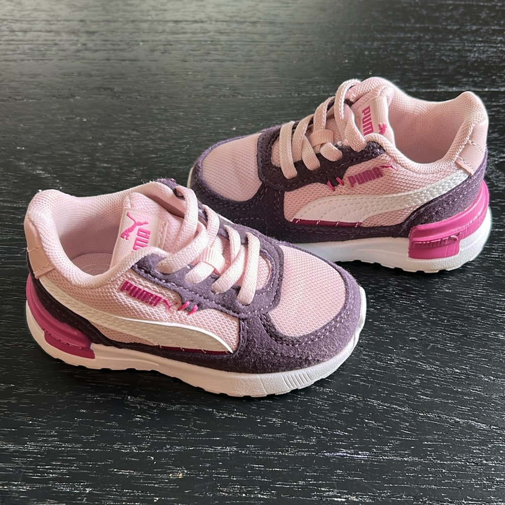Worn once! Puma Pink and Purple Sneakers with Lace-Up Design